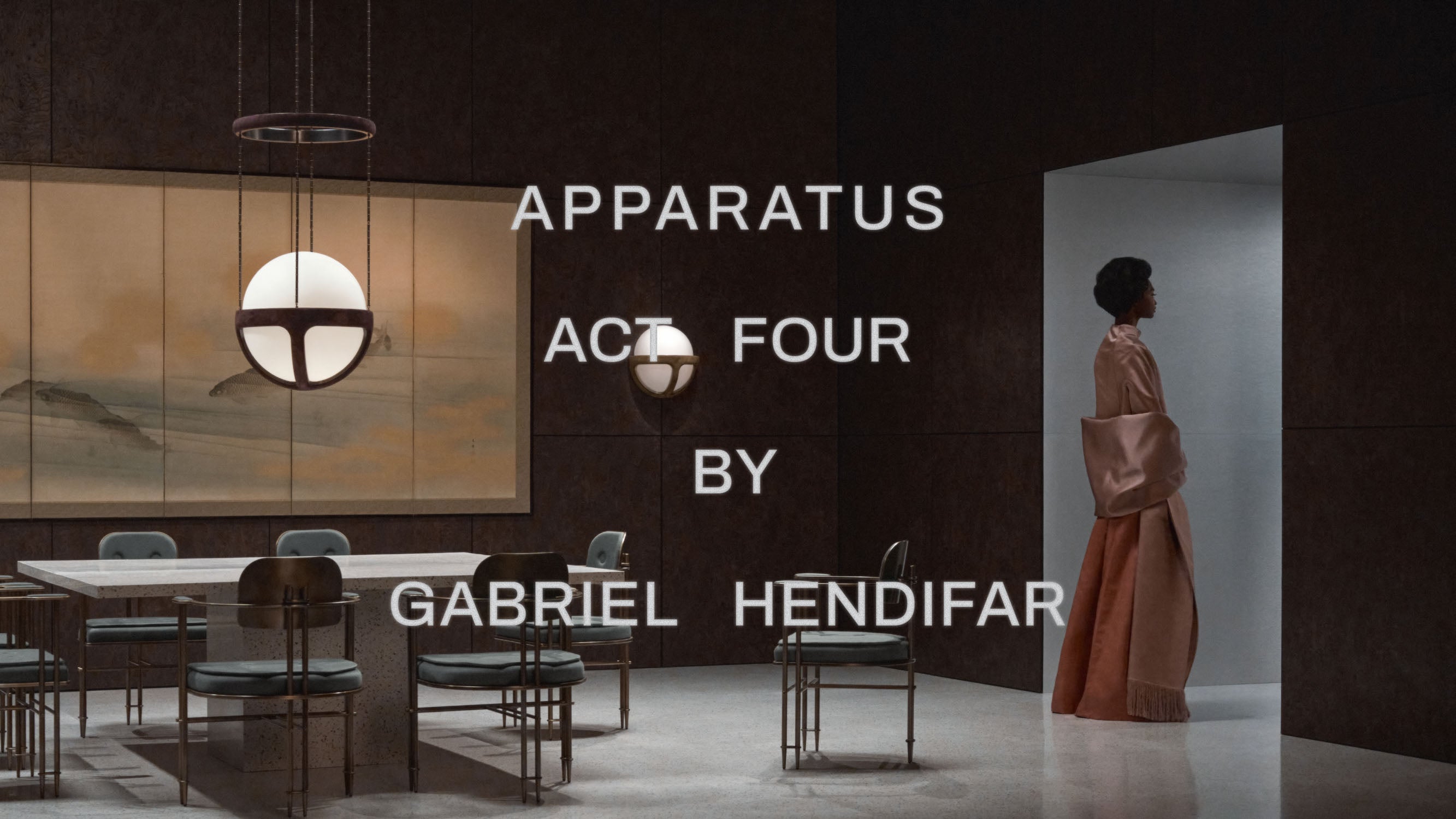Minimalist dining room with dark walls, geometric pendant lights, wooden chairs, and a person in a rust-colored outfit near doorway