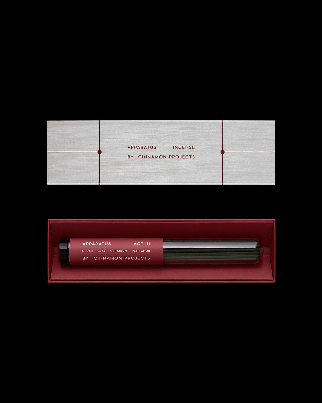 Minimalist rectangular incense box and glass tube with red label, featuring ACT III scent by Cinnamon Projects on black background