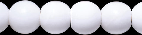 Close-up of a white round bead necklace with smooth matte finish on a black background