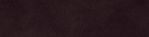 Close-up view of dark brown textured leather surface with subtle grain pattern and natural creases