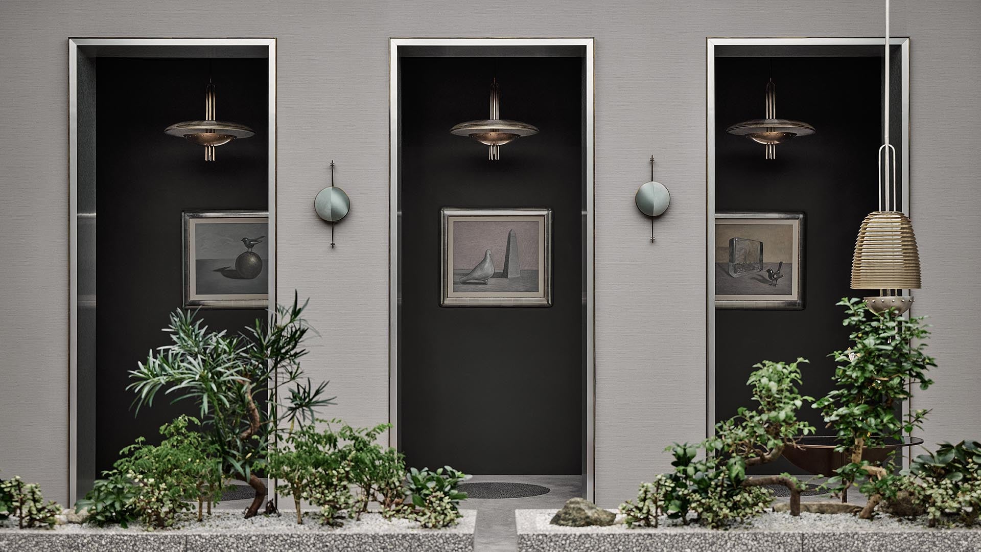 Three dark recessed wall niches with framed abstract artwork, round wall sconces, and green plants in a minimalist setting